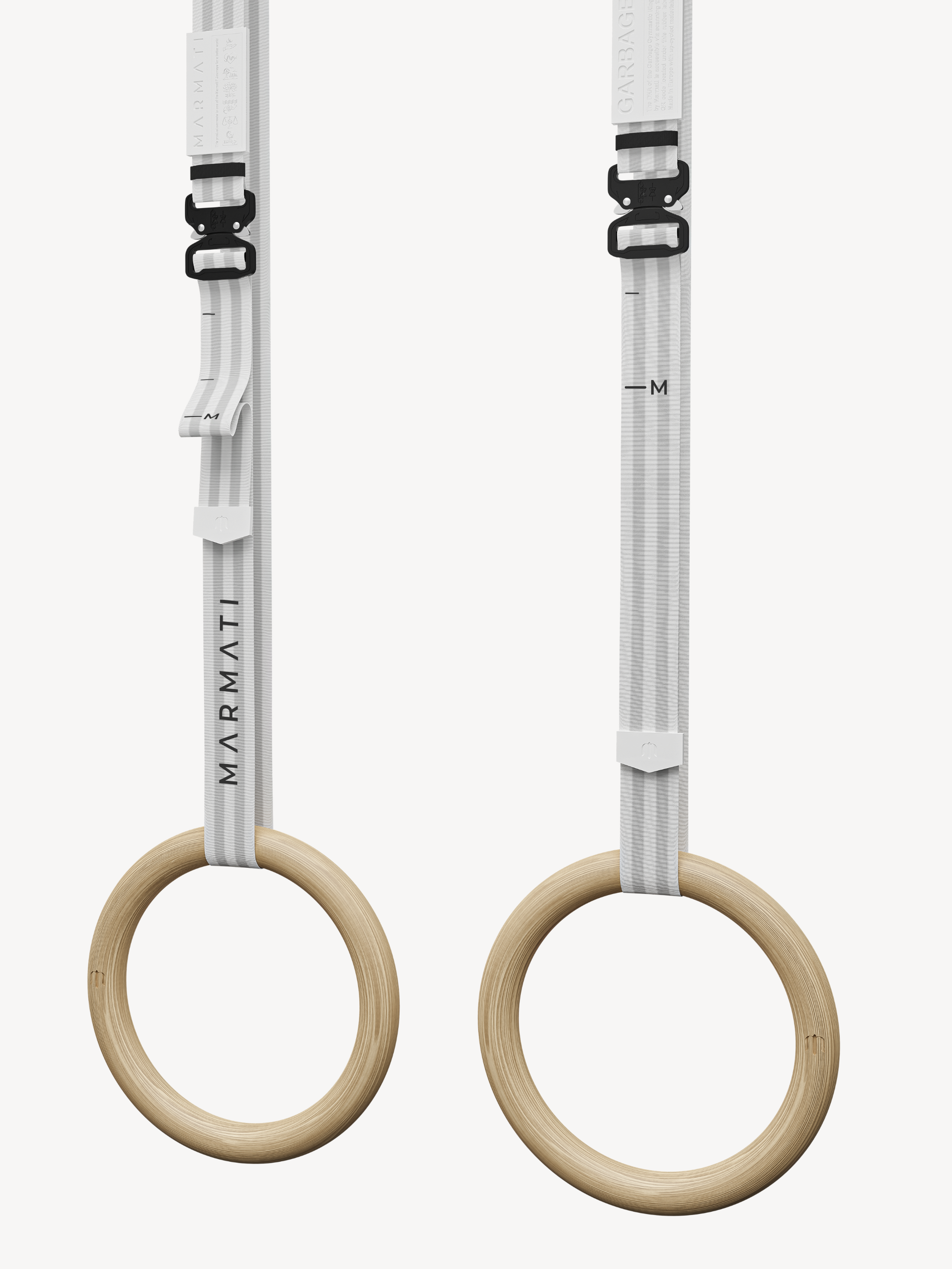 GARBAGE GYMNASTIC RINGS by Marmati in white colour are made from recycled gym rings, creating an eco-friendly exercise option. Get a great workout wherever you are, while also reducing your environmental impact.