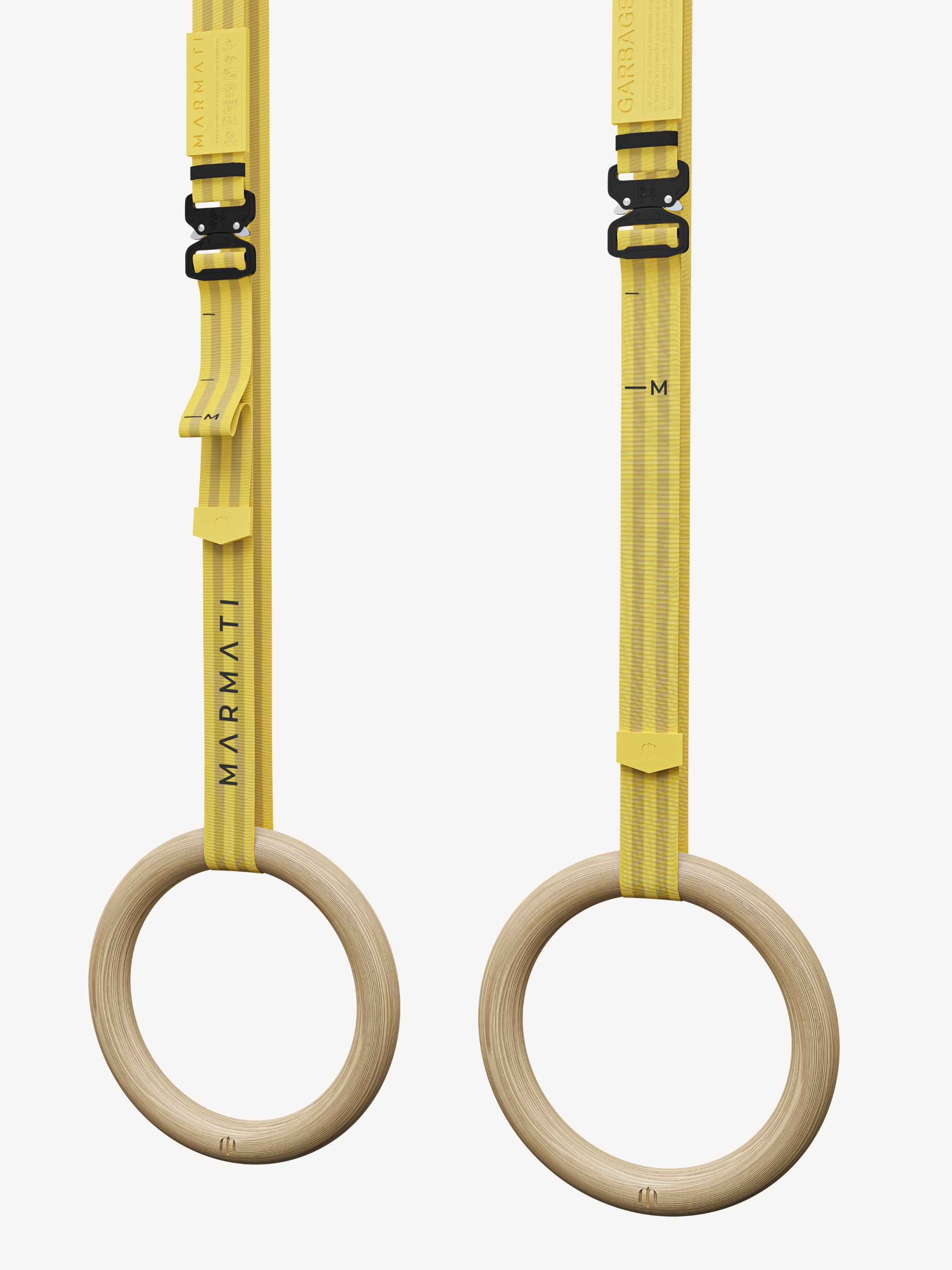 GARBAGE GYMNASTIC RINGS in YELLOW - This is the perfect choice for adventurers looking to take their skills to the next level. GARBAGE GYMNASTIC RINGS provide a unique challenge, allowing one to test their athletic prowess in a dynamic and exciting manner. Create your own daring stunts with these sophisticated sports equipment and take your workout beyond the limits.