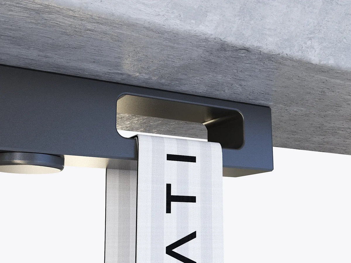 Close-up of a modern desk with a metal bracket and 'ATIV' branding. #color_black #size_l