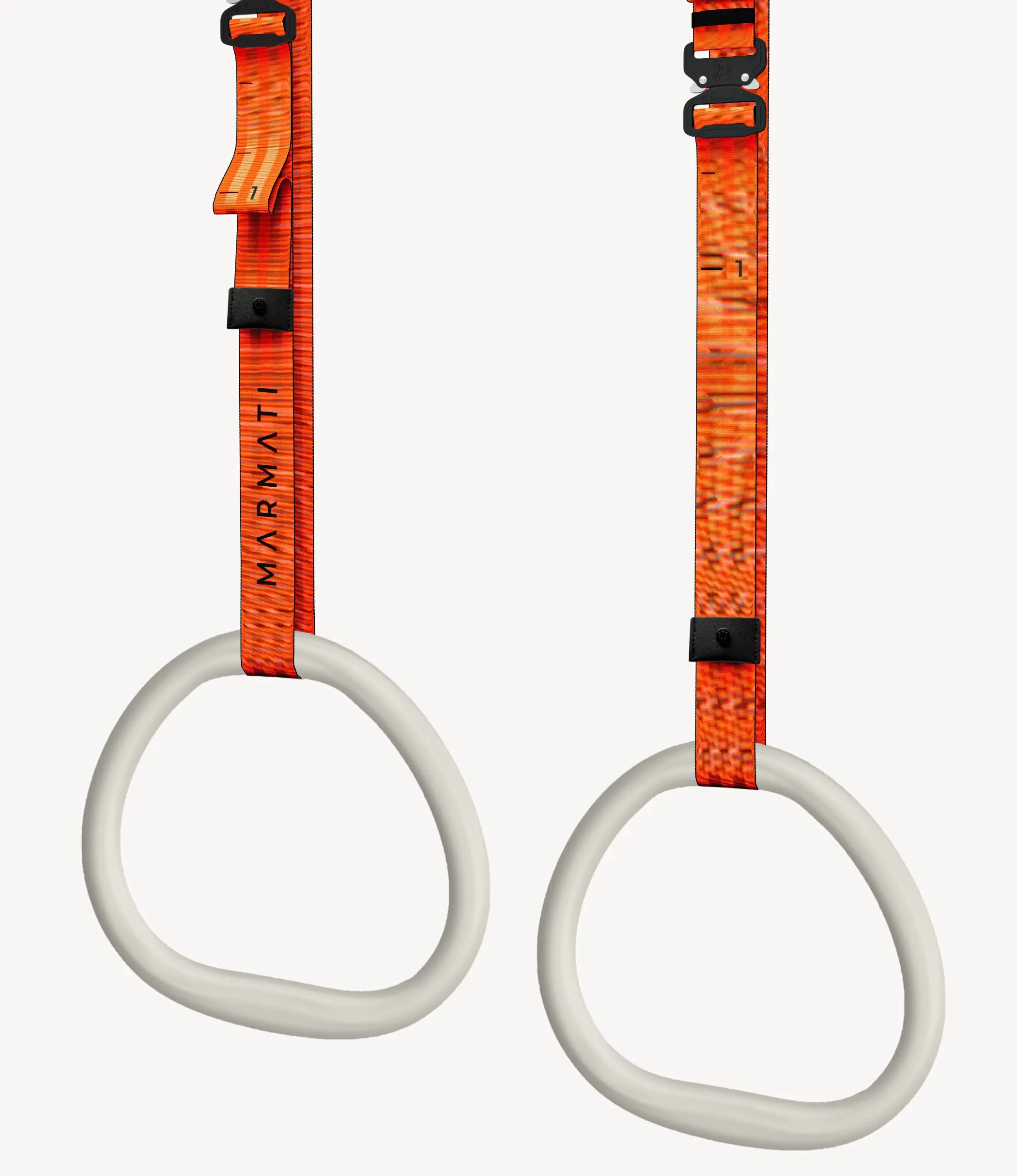 Set of adjustable gymnastic rings featuring smooth ergonomic handles for calisthenics exercises.